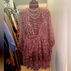 Purple floral dress with fine details.